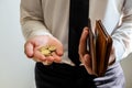 The hands of businessmen holding coins and wallets to save money, expand a growing business to success and save for retirement Royalty Free Stock Photo