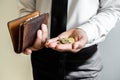 The hands of businessmen holding coins and wallets to save money, expand a growing business to success and save for retirement Royalty Free Stock Photo