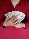 hands of a businesswoman holding american dollars banknotes Royalty Free Stock Photo