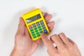 Hands calculate using a calculator on white background Royalty Free Stock Photo