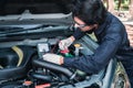 Hands of car mechanic working in auto repair service Royalty Free Stock Photo