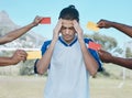 Hands, card and man with stress from soccer, training headache and warning on the field. Sports, burnout and frustrated Royalty Free Stock Photo