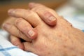 Hands of a care-dependent person Royalty Free Stock Photo