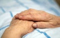 Hands of a care-dependent person