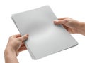 Hands carefully holding a stack of gray paper sheets Royalty Free Stock Photo