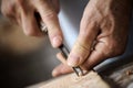 Hands of a carpenter, close up Royalty Free Stock Photo