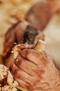 Hands of a carpenter using a manual planer to plane wood Royalty Free Stock Photo