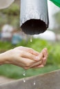 Hands catching clean falling water close up Royalty Free Stock Photo