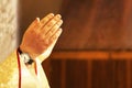 hands of a catholic priest when praying at a holy mass Royalty Free Stock Photo