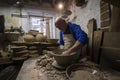 Hands of ceramic artist making a piece