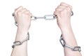 Hands in chain shackles on white background isolated Royalty Free Stock Photo