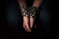 Hands chained in chains isolated on black background Royalty Free Stock Photo