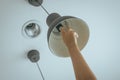 Hand changing with new LED lamp light bulb,Power saving concept