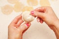 Hands of chef with dumplings Royalty Free Stock Photo