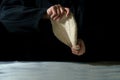 Hands of chefs preparing dough for italian pizza, pasta or bread on dark Royalty Free Stock Photo