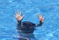 Hands of child drowning Royalty Free Stock Photo