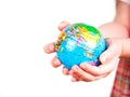 Hands of a child holding a globe Royalty Free Stock Photo