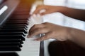 Hands of the child on the piano keys. Selective focus. Music abilities for kids Royalty Free Stock Photo