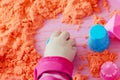 The hands of a child playing with kinetic sand Royalty Free Stock Photo