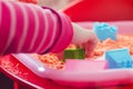 The hands of a child playing with kinetic sand Royalty Free Stock Photo