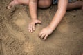 Hands of child playing with sand outdoor Royalty Free Stock Photo