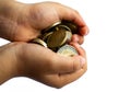 The hands of a child up close holding isolated euro coins