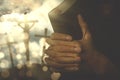 Hands of a Christian man with a bible Royalty Free Stock Photo