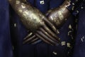 Hands clasped together of a Buddha statue in Buddhism Royalty Free Stock Photo