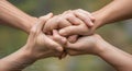 Hands clasped together in unity and support Royalty Free Stock Photo