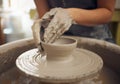 Hands, clay and pottery with a woman designer working in a studio or workshop for art, design and ceramics. Creative Royalty Free Stock Photo