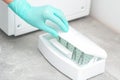 Hands cleans medical tools by ultrasonic cleaner