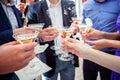 Hands clink glasses with champagne Royalty Free Stock Photo