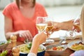 Hands clinking wine glasses Royalty Free Stock Photo