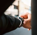 Hands, clock and time with business man in street, road with calendar date, schedule and notification. Entrepreneur, iot Royalty Free Stock Photo