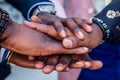 Hands closeup of group black afro american friends men businessmen in stylish business suit, expensive wristwatch