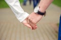 Hands closeup of a loving couple, romance, love, jeans. Concept idyll Royalty Free Stock Photo