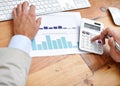 Hands, closeup and man with calculator, graphs and keyboard with a budget, worker and inflation. Male worker, employee Royalty Free Stock Photo