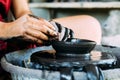 Hands closeup, working on pottery wheel with ceramics Royalty Free Stock Photo