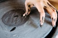 Hands closeup, working on pottery wheel with ceramics Royalty Free Stock Photo