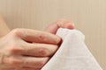 Hands of clothier sew canvas fabric with needle close up Royalty Free Stock Photo