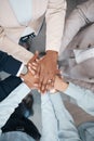Hands, collaboration and solidarity with a team of business people standing in a huddle or circle in the office from Royalty Free Stock Photo