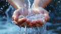 Hands collect water in a fistful, World Water Day