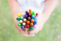 Hands with colourful crayons Royalty Free Stock Photo