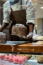 A hands of confectioner-chocolatier during at work. The making of cake Royalty Free Stock Photo