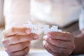 Hands connecting jigsaw puzzle. Business solutions, success and strategy concept. Close up photo with selective focus Royalty Free Stock Photo