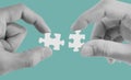 Hands connecting jigsaw puzzle Royalty Free Stock Photo