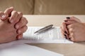 Hands of contractual parties, a woman and a man, signing a contract Royalty Free Stock Photo