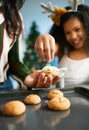 Hands, cookies and baking with a mother and daughter in the kitchen on Christmas for the festive season. Family Royalty Free Stock Photo