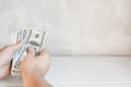 Hands counting american money, free space Royalty Free Stock Photo