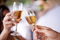 Hands, couple and glass with champagne to toast, celebrate and anniversary with date for bonding. Closeup, relationship Royalty Free Stock Photo